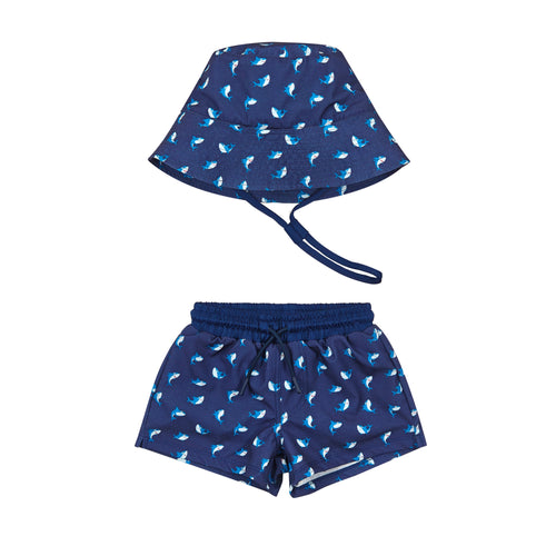 Navy swim hat and shorts set with white pattern on a white background